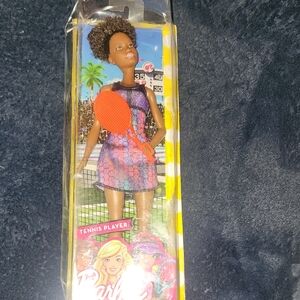 Barbie Tennis Player Doll with Red Racket and Colorful Dress